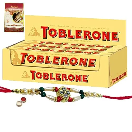 Delightful Toblerone with Free Nice Rakhi, Roli , Tilak and Chawal