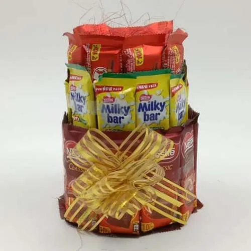 Delightful 3 Layer Tower Arrangement of Nestle Chocolates