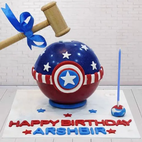 Sumptuous Captain America Pi�ata Cake with Hammer for Kids