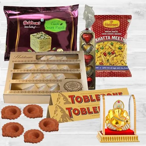 Luscious Evening Sweets-Snacks Delicacy Hamper with Diya n Lord Idol