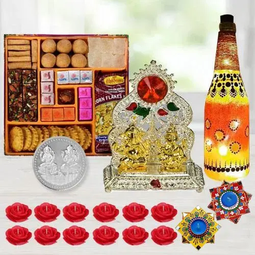 Exclusive Diwali Gift of Ganesh Laxmi Mandap, Diya, Lamp, Sweets, Snacks, Candles n Free Coin