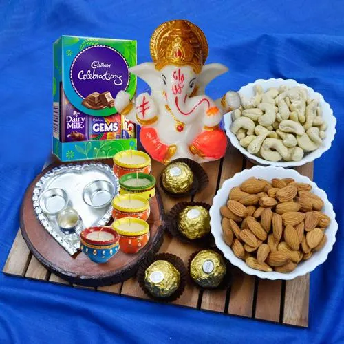 Enticing Combo of Puja Thali, Dry Fruits, Chocolates N Lots
