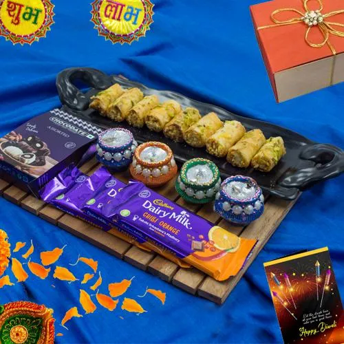 Ideal Diwali Gift of Roll Baklava n Cadbury Chocolates with Wax Diya