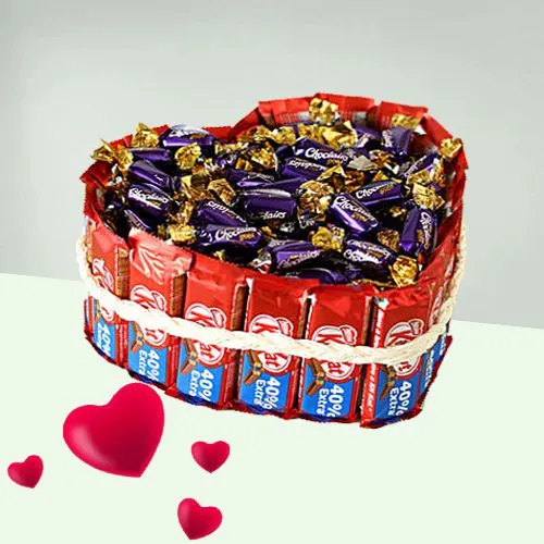 Tasty Kitkat n Cadbury Candies in Heart Shape Bouquet