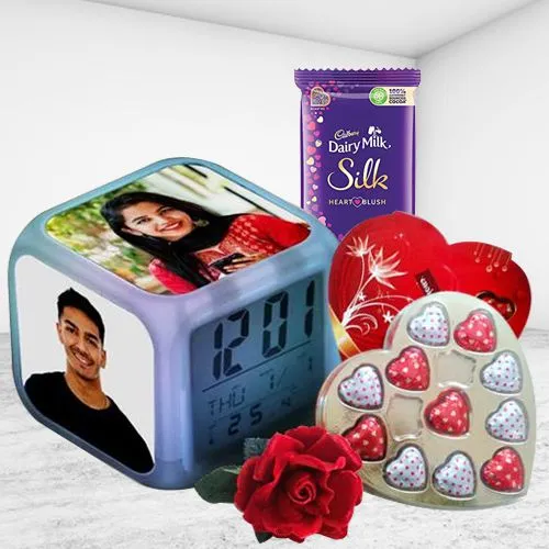 Exciting Gift of Personalized Photo Clock with Heart Shape Chocolates n Roses