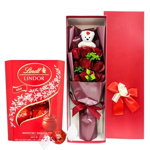 Impressive gift Combo of Artificial Roses with Teddy Bouquet n Lindt Lindor