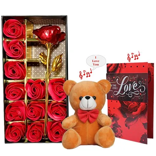 Classy Arrangement of Artificial Red Roses with Musical Teddy N Card