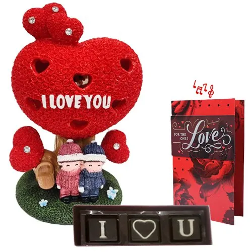 Exclusive Gift of Couple Statue with Chocolate N Musical Greetings Card
