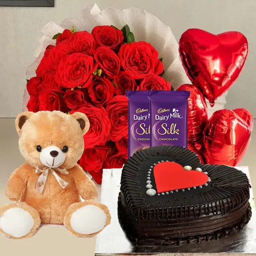 Captivating Red Roses, Chocolate Cake, Mylar Balloons, Chocolates and a Teddy