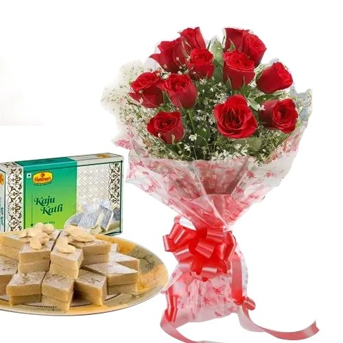 Lovely charming Red Roses combined with mouthwatering Kaju Katli