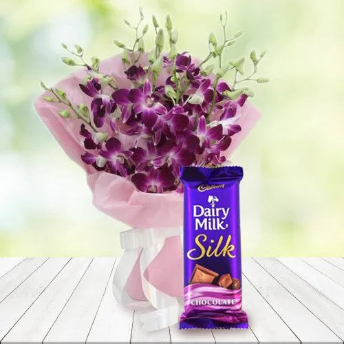 Send Bouquet of Orchids and Cadbury Dairy Milk Silk