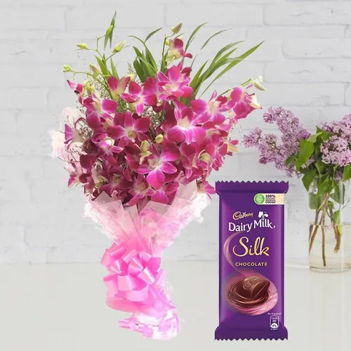 Online Orchids Bouquet and Cadbury Dairy Milk Silk
