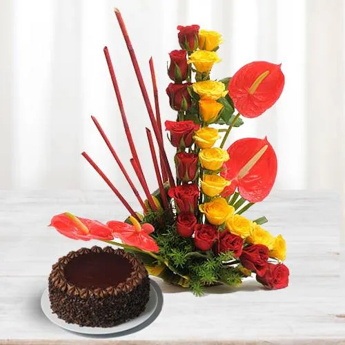 Attractive Arrangement of Roses n Anthodium with Chocolate Cake