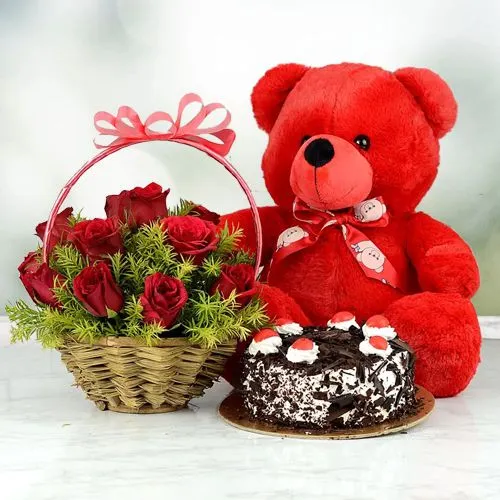 Amazing 12 Red Roses Basket with Black Forest Cake n Teddy