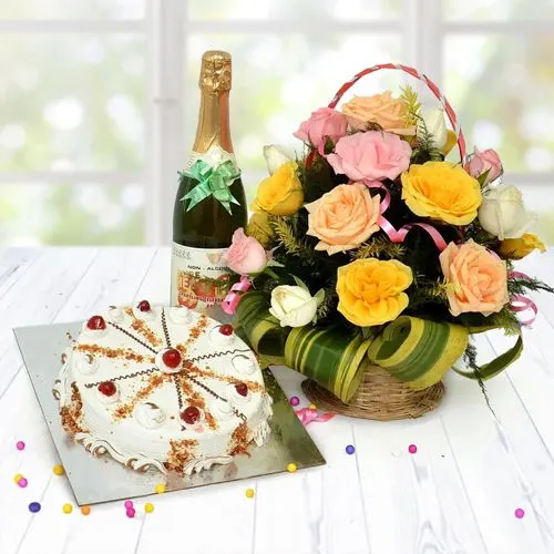Gorgeous Basket of Mixed Roses with Butter Scotch Cake n Fruit Juice