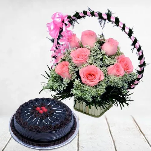 Alluring Pink Roses Basket with Tasty Chocolate Cake