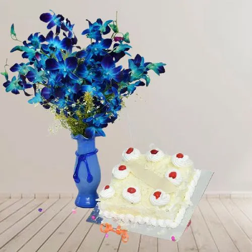 Fascinating Combo of Blue Orchids in Vase n White Forest Cake