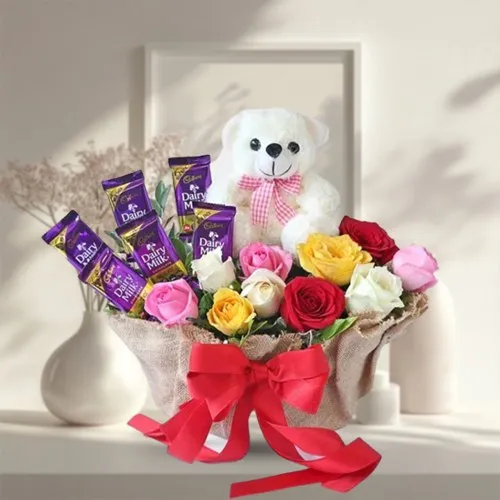 Dazzling Basket of Cadbury Chocolates with Mixed Roses n Teddy