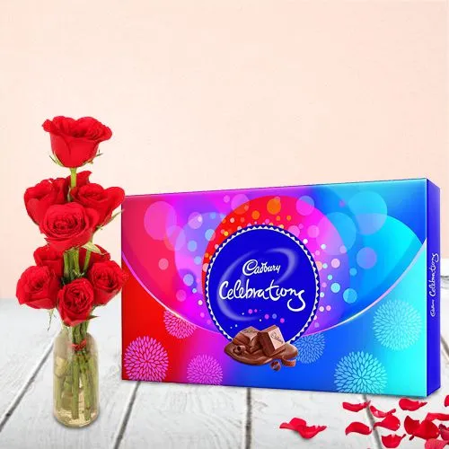 Awesome Display of Red Roses in Vase with Cadbury Celebration