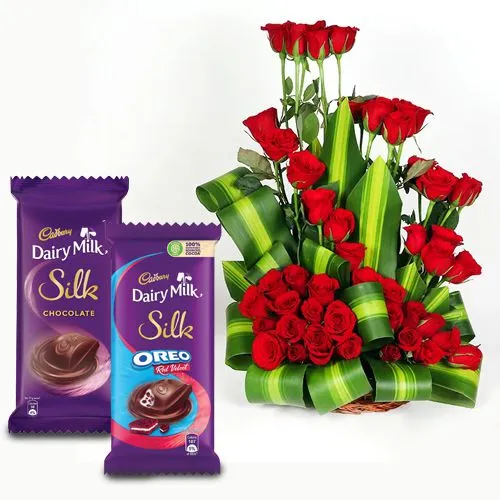 Enigmatic Basket of Red Roses with Cadbury Silk Pair