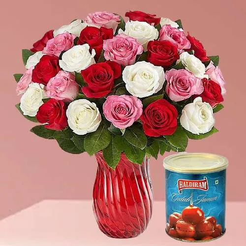 Splendid Mixed Roses in Vase with Haldiram Gulab Jamun