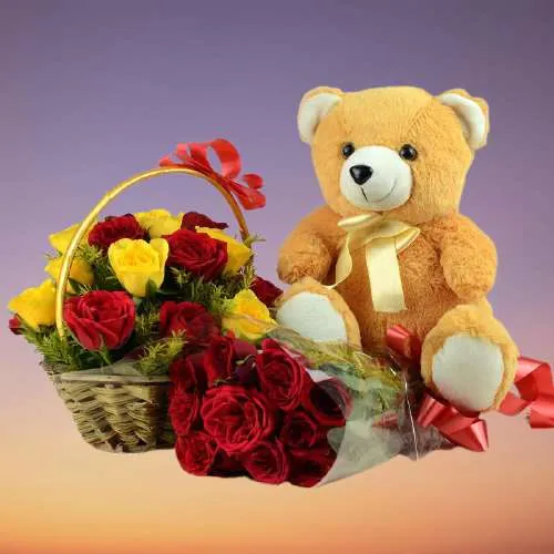 Charming Yellow n Red Roses Basket with a Teddy Brown