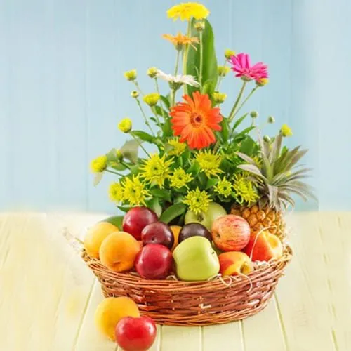 Wholesome Fresh Fruits with Gerberas Gift Basket