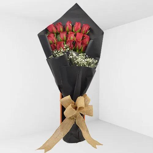 Breathtaking Bouquet of Red Roses in Black Tissue Wrap