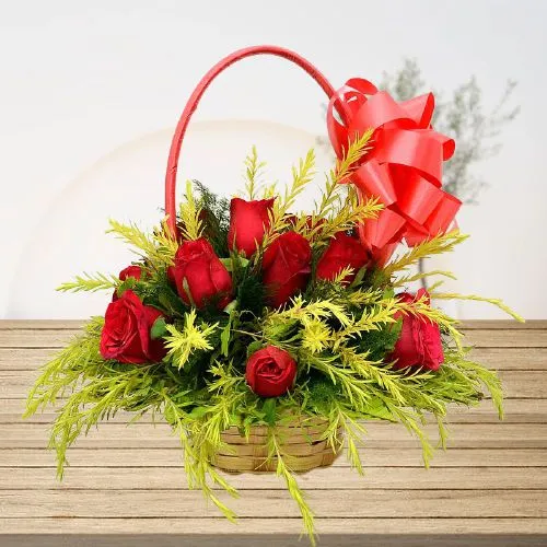 Exclusive Round Basket of 12 Red Roses