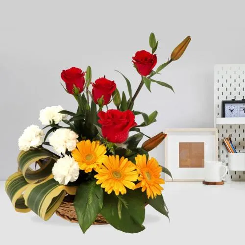 Enticing Basket Decked with Seasonal Flowers