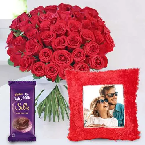 Spectacular Gift of Red Rose Bouquet with Personalized Cushion n Cadbury Silk	