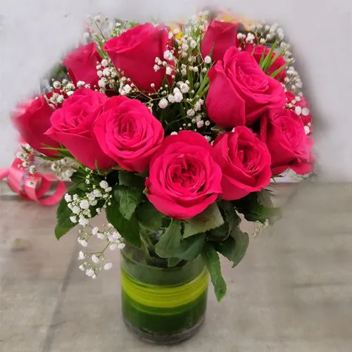Elegant Beauty of Red Roses in Glass Vase