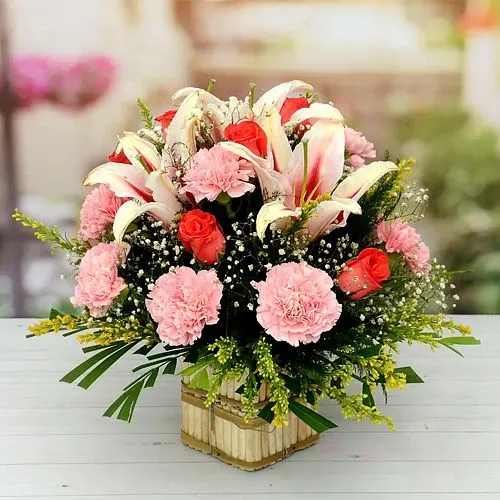 Expressive Basket Full of Carnations Lily N Roses 	