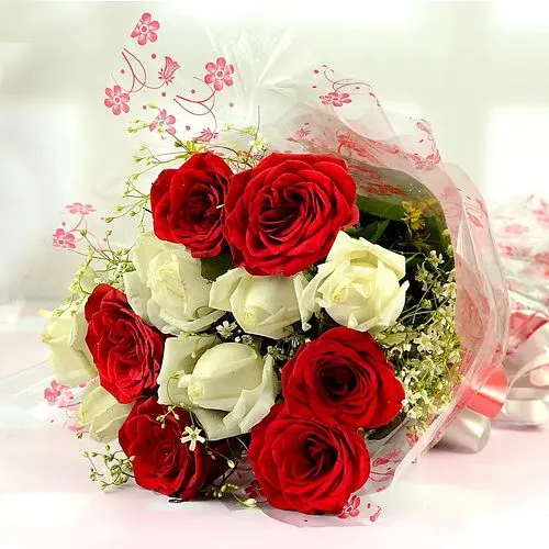 Fragrant Bouquet of Red and White Roses with Green Ferns