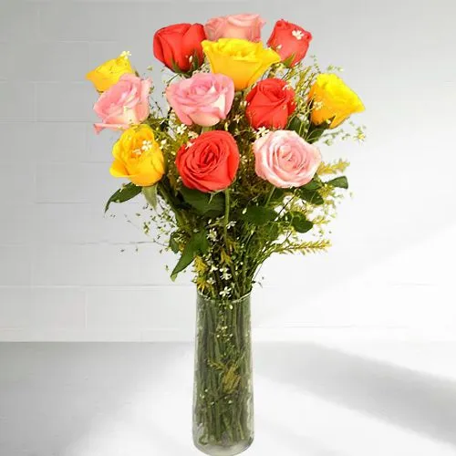 Bright Arrangement of Orange Yellow N Pink Color Roses in Glass Vase