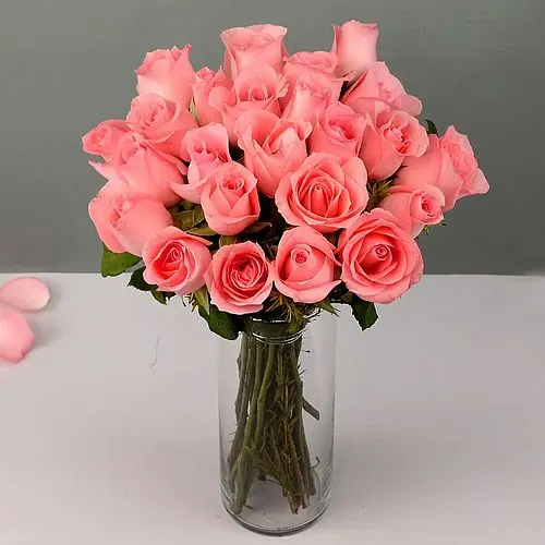 Expressive Array of Pink Roses in a Glass Vase