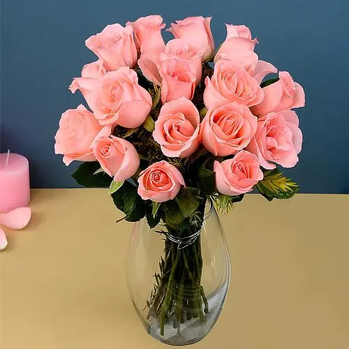 Glorious Array of Pink Roses in a Glass Vase