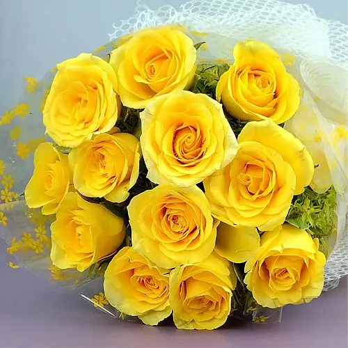 Bright Bouquet of Yellow Roses with Green Leaves