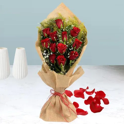 Tender Arrangement of Red Roses Jute Bouquet
