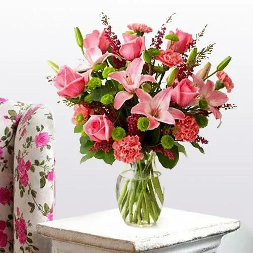 Heavenly Arrangement of Lilies, Roses and Carnations with a Circus of Celebration