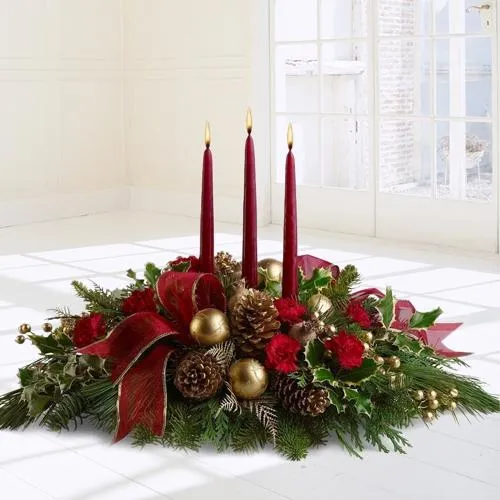 Lovely arrangement of magnificent Roses, Gerberas and Candles