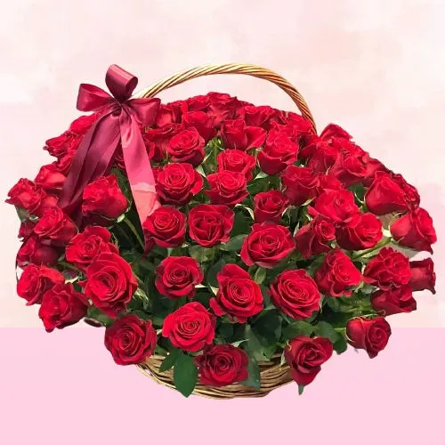 Designer Red Roses Basket decorated with Green Leaves