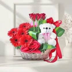 Breath taking Red Gerberas and Roses Basket with Cute Teddy