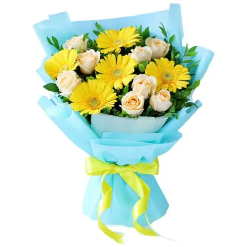 Graceful Bouquet of White Roses n Yellow Gerberas in Tissue Wrap