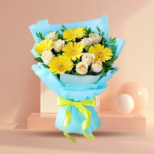 Graceful Bouquet of White Roses n Yellow Gerberas in Tissue Wrap