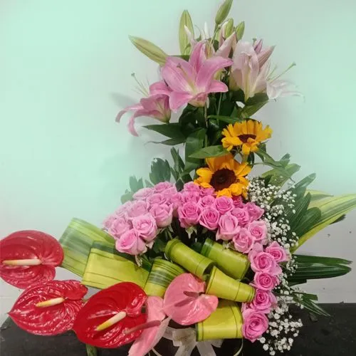 Blushing Arrangement of Mixed Seasonal Flowers