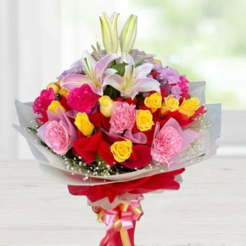 Gorgeous Tissue Wrapped Arrangement of Assorted Flowers