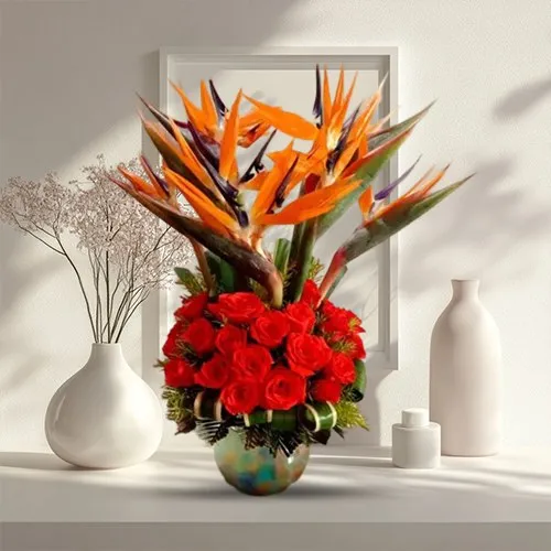 Alluring Red Roses N Birds of Paradise Arrangement