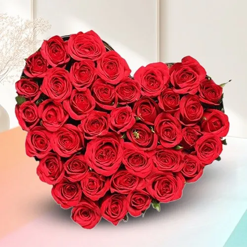 Glamorous Heart Shape Arrangement of 100 Red Roses