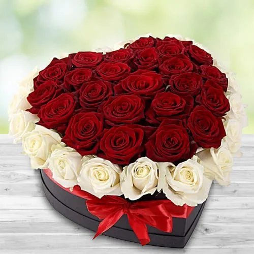 Attractive Heart Shaped Box of Red and White Roses